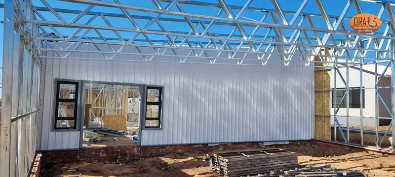 Residential house extension canopy using ORALS-supplied structural systems and materials