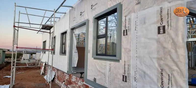 Residential house external cladding using ORALS-supplied structural systems and materials